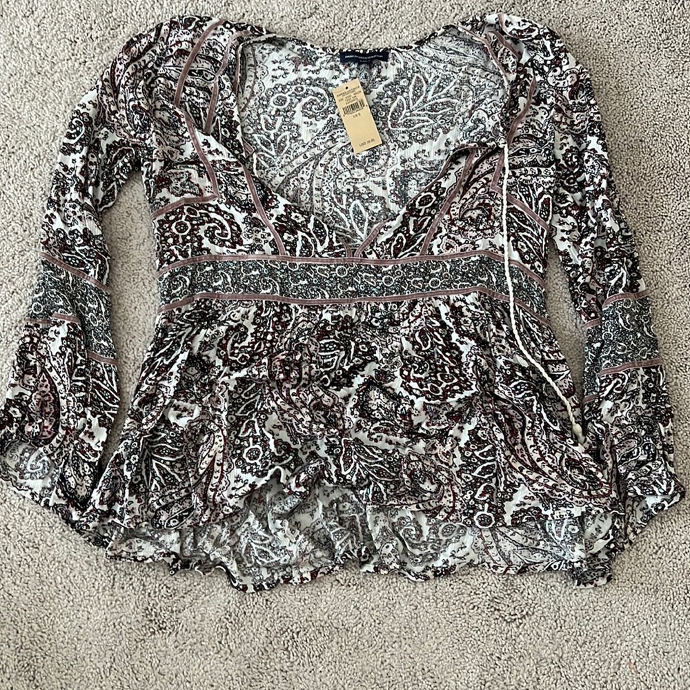 Women’s multi-colored flare sleeve top